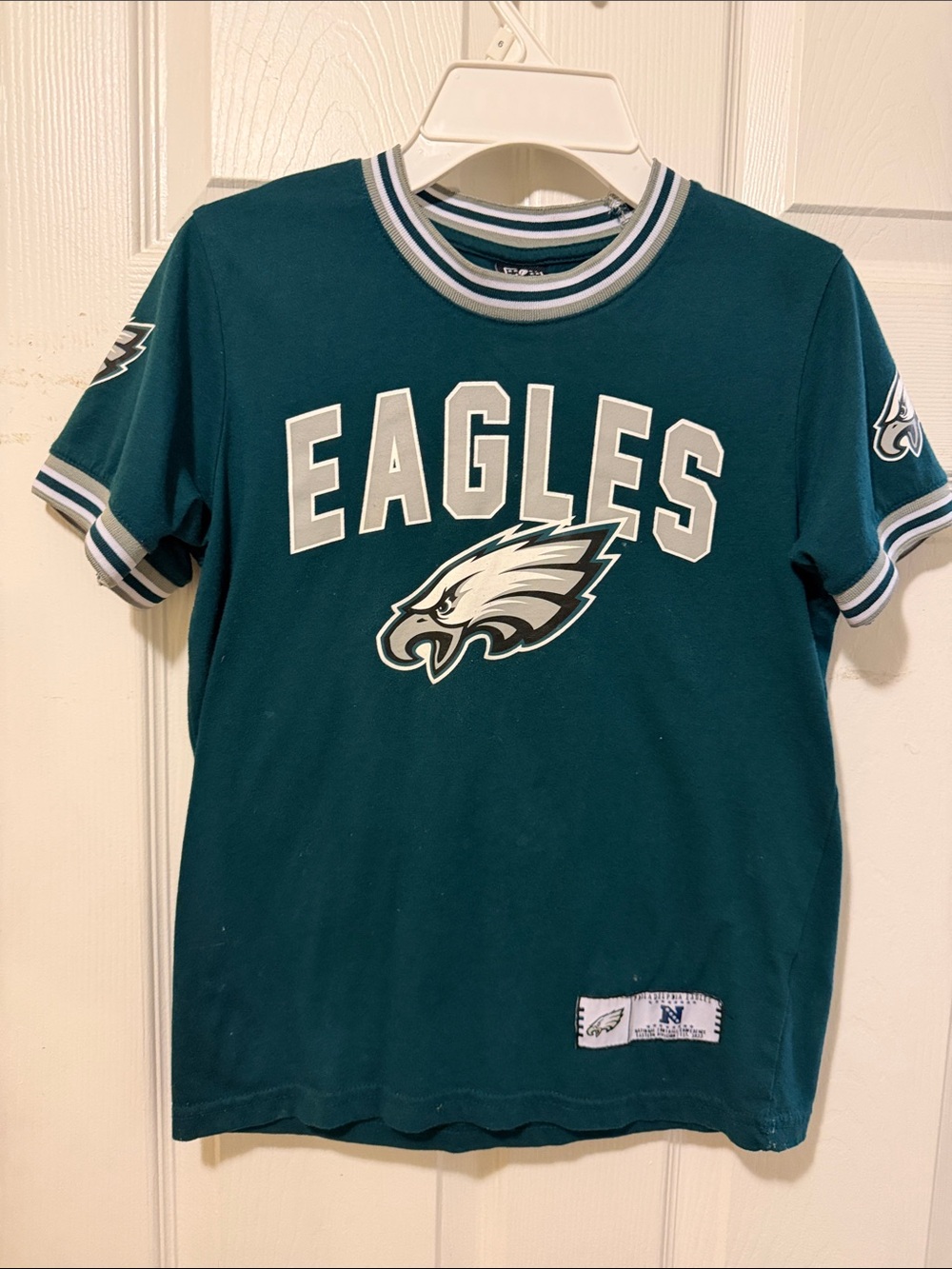 eagles jersey like T-shirt PLUS more! 8-10/12 and all black gap sweatsuit
